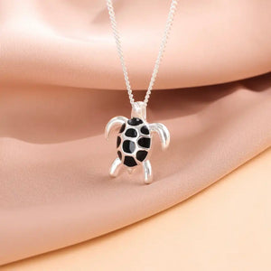 black turtle necklace